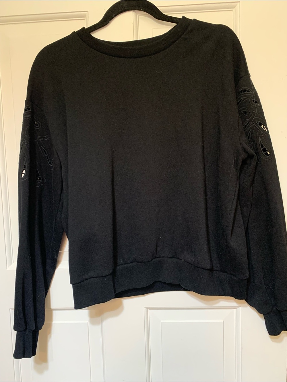 Women’s Black GAP Sweatshirt with lace cut out on arm.  Size large, no tag.